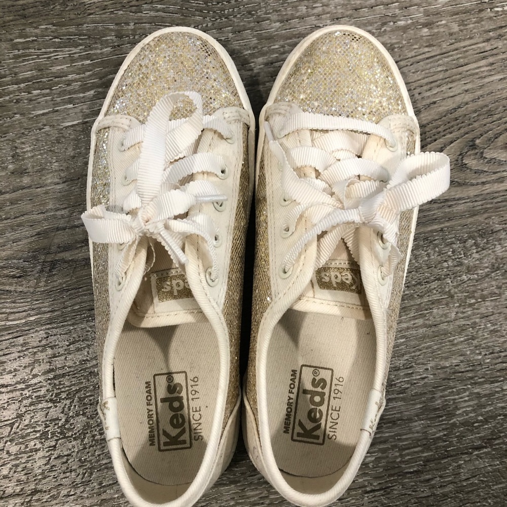 Keds girls gold and cream sparkle shoes.